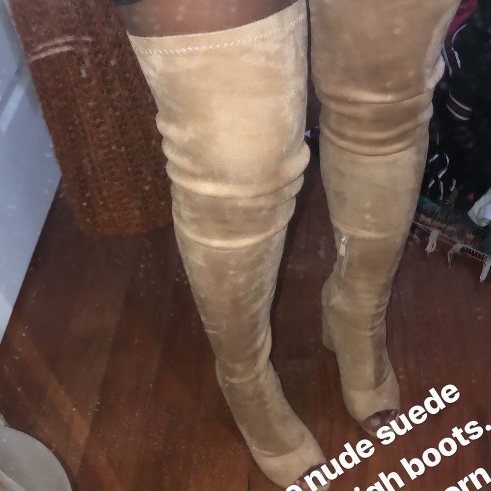 Nude suede peep toe thigh high boots.
